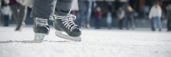 Ice skating on an ice rink